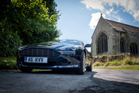 A Dark Blue Aston Martin DB9 on The Cannon Run 3000 Promo Day