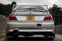 A Silver Mitsubishi Lancer Evolution VI Tommi Makinen Edition