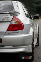a Silver Mitsubishi Lancer Evolution VI Tommi Makinen Edition