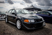 A Black Mitsubishi Lancer Evo VI TME X527AHY