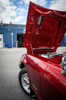 A Metallic Red Datsun 240z