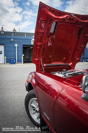 A Metallic Red Datsun 240z