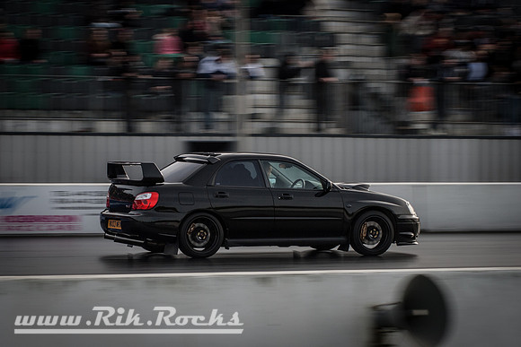 A Black Subaru Impreza WRX STi S9