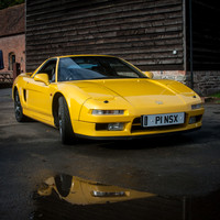 A Yellow Honda NSX 1996